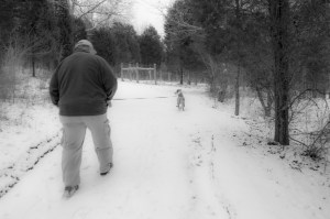 Emme was impatiently trying to drag Dad up the hill going back to the bison pen. 