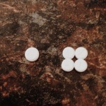 This picture doesn't show  how teensy they are, but the four together are about the size of a fingernail. The day I messed up my dose, I took the four small ones - 4mg and left the one larger one - 5mg - behind. Oops. 